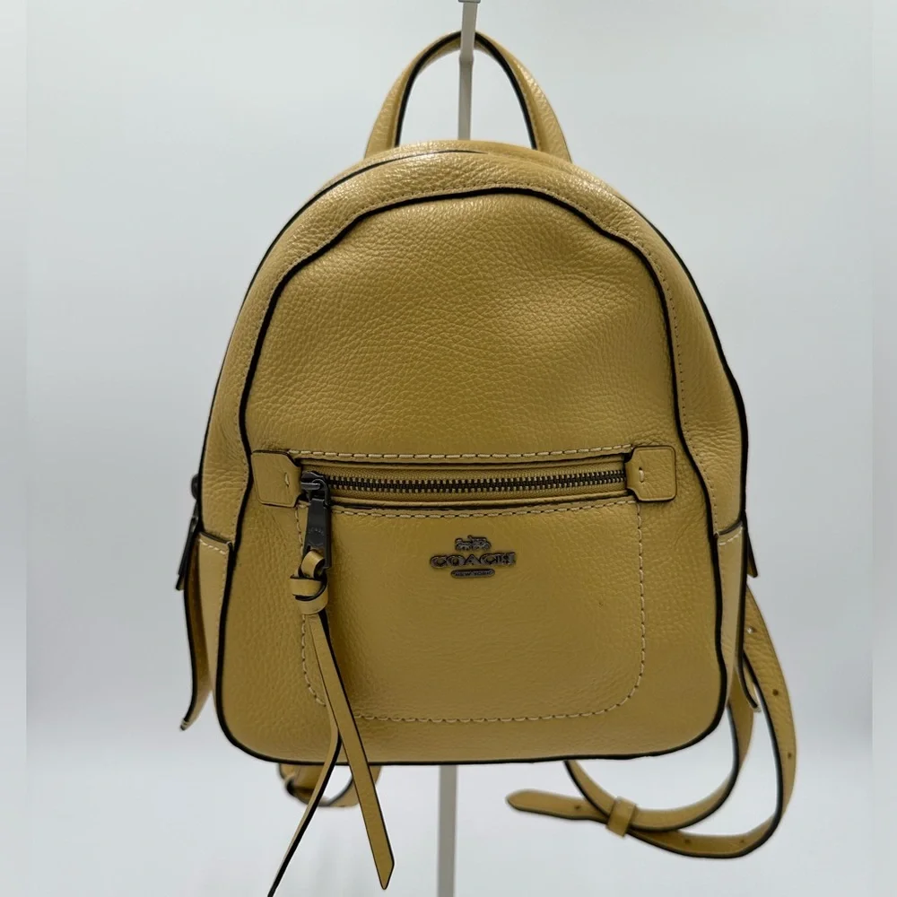 EUC Coach Andi Convertible Backpack with Structured Design. Metallic Hardware.